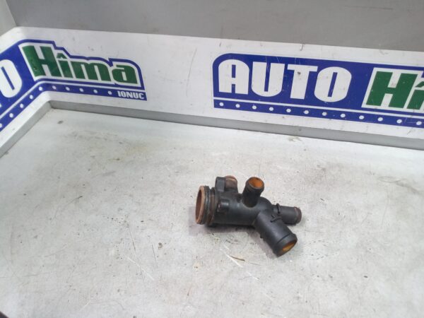 Flansa lichid racire motor YC1Q-8A544-AC / 2.4TDCI-4×4 Ford Transit MK6  2006-2013