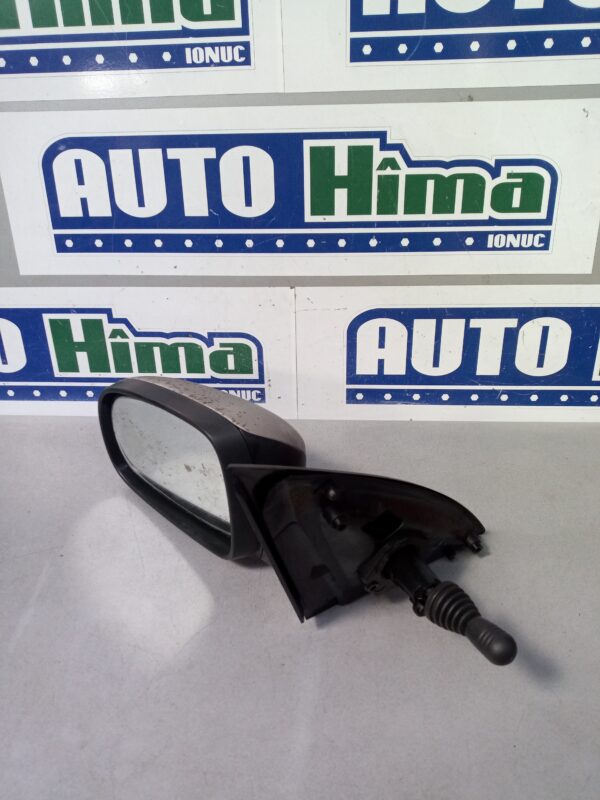 Oglinda retrovizoare manuala stanga E1010676 (Alba) Opel Corsa C  2000-2012